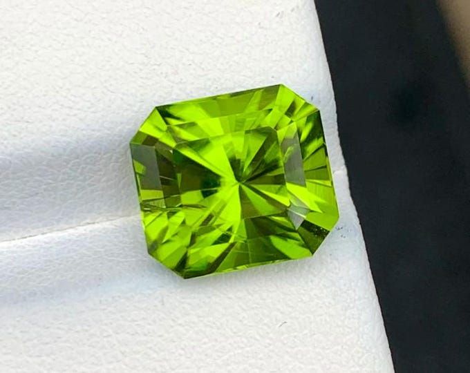 Lab Certified, Apple Green Color, Collector Size, 6.98 Carat, Radiant Cut Peridot, Appraised at 3,575 Dollars