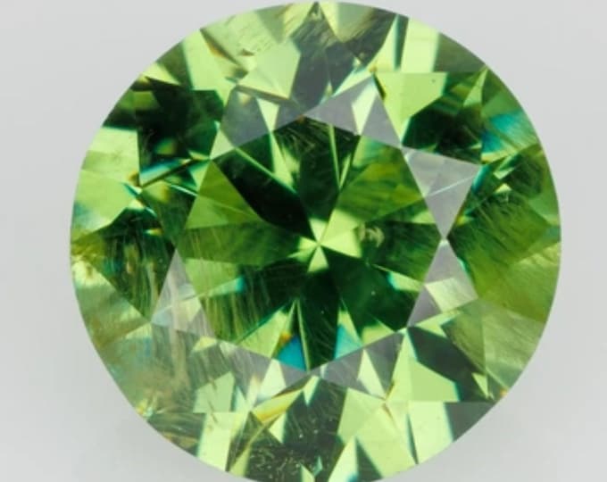 Lab-Certified, Russian Origin, .60 Carat, Round Cut, Demantoid Garnet with RARE Horsetail Inclusions