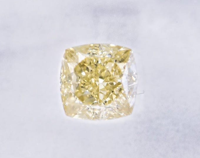 IGI Certified, NATURAL, Untreated, .65 Carat Cushion Cut, CLEAN, VS1 Clarity Fancy Yellow Diamond