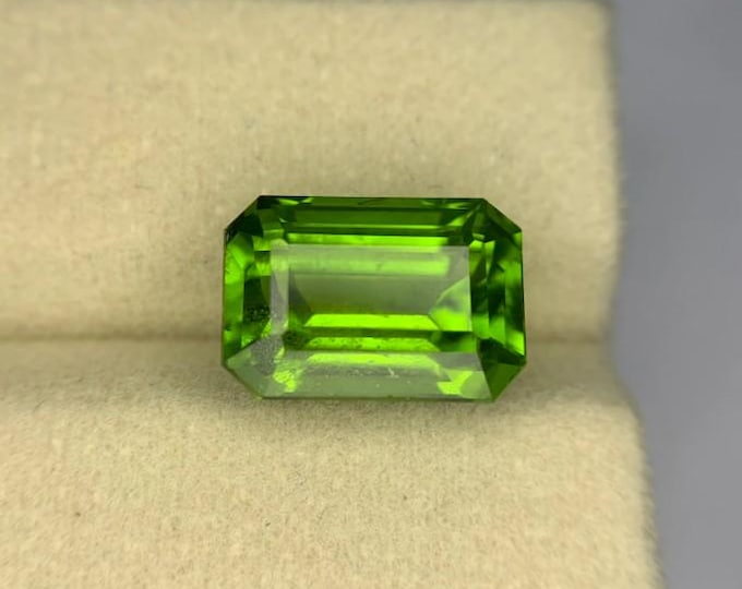 Lab Certified, Apple Green Color, HUGE, 9.33 Carat, Emerald Cut Peridot, Appraised at 4,325 Dollars