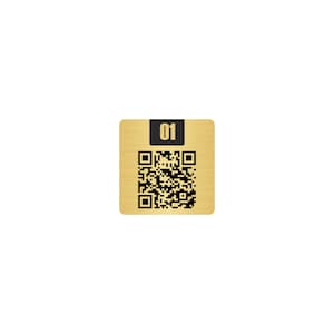 May include: A square, gold-colored QR code label with a black QR code and the number "01" in white on a black rectangle at the top. The label has a wood grain texture.