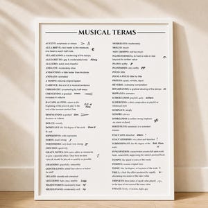 May include: A white poster with black text titled MUSICAL TERMS, listing various musical definitions and symbols in two columns. The document provides explanations for terms such as accent, allegro, crescendo, and staccato, including their corresponding notation symbols throughout the list.