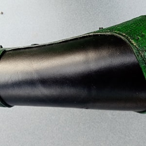 Leather bracer with punched lizard look