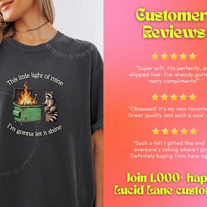 funny dumpster fire shirt, dumpster fire raccoon shirt, raccoon dumpster fire meme tee, trash panda shirt, funny raccoon graphic tee, this little light of mine parody shirt, chaotic raccoon shirt, anxiety humor shirt, funny meme t shirt, roasting marshmallow raccoon tee, comfort colors funny shirt, ironic humor tee, relatable humor shirt, chaos meme shirt, funny animal meme shirt, satirical graphic tee, unhinged raccoon tee, funny gift shirt, mental health meme tee, sarcastic tee, viral shirt
