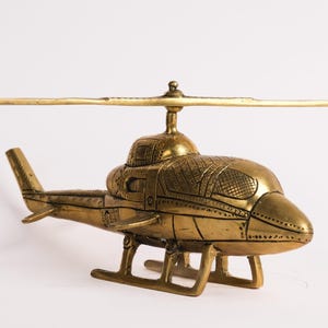 Vintage Brass Helicopter Showpiece: A Nostalgic Decor Accent