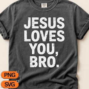 May include: A charcoal gray short-sleeve t-shirt featuring the white distressed-style text JESUS LOVES YOU, BRO. printed on the front. The shirt has a crew neckline and a Comfort Colors brand label visible on the inside of the collar area.