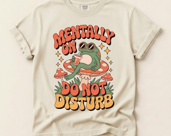 Mentally On Do Not Disturb Frog PNG, Retro Cartoon Frog On Mushroom With Iced Coffee, Whimsical Forest Clipart For Introverts