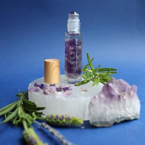 Crystal infused pulse point aromatherapy oil with real crystal roller ball for relaxing, perfect gift or stocking filler