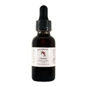 May include: A 1-ounce bottle of Cleavers (Galium aparine) herbal tincture from Red Cardinal Herbals. The bottle is dark brown glass with a black dropper cap. The label is white with red cardinal flower illustrations and text.