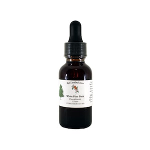 May include: A small brown glass bottle with a dropper top. The bottle is labeled "Wild Cardinal Herb" and "White Pine Bark" with a small illustration of a pine tree. The bottle contains 1 ounce of pine extract.
