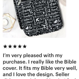 May include: Black Bible cover with a white zipper and a white print of inspirational words and phrases. The words include "Be Holy", "Be Joyful", "Be Brave", "Be Thankful", and "Be Loving".
