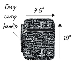 May include: Black crossbody bag with a white print of inspirational words and phrases. The bag measures 7.5 inches wide and 10 inches tall.