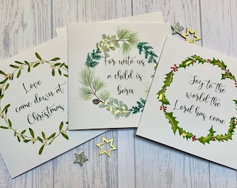 Pack of Christian Christmas cards.  Beautiful hand foiled and embellished Christmas wreaths surrounding Christmas messages. Luxury  cards