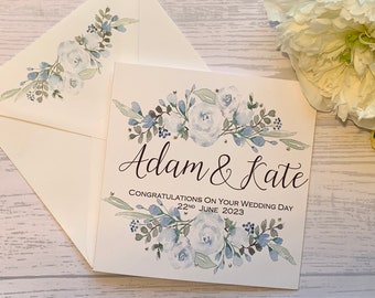 Personalised wedding card with  powder blue flowers and delicate rhinestones. Congratulations. On your wedding day