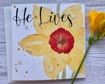 Pack Christian Easter cards.  Loose watercolour style daffodil with 'He lives' across the top.. Luxury cards. Christian cards