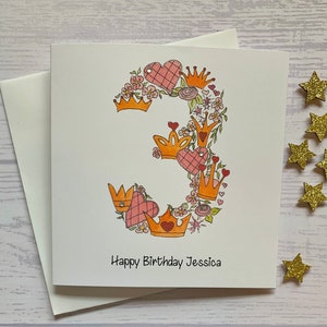 Princess personalised 3rd  birthday card . Cartoon style watercolour illustration of the number 3 embellished with silver metallic detail.
