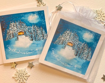 Pack of Luxury Christmas cards. Beautiful watercolour cosy winter scene embellished with hand foiled dots.  Luxury cards