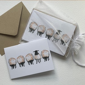 Lot de 6 jolis carnets avec des aquarelles super mignonnes de moutons reproduites sur du carton blanc.