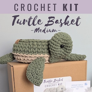 May include: Crochet kit for a medium-sized turtle basket. The kit includes yarn, a crochet hook, and instructions. The finished basket is green and beige and has a cute turtle face.