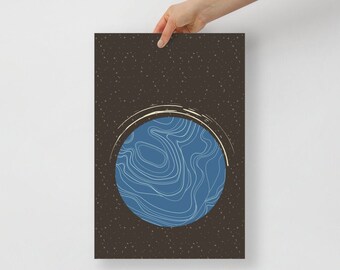 May include: A blue and white abstract planet design on a dark brown background with white speckles. The design is in a circle with a white ring around it. The text "12x18" is below the design.
