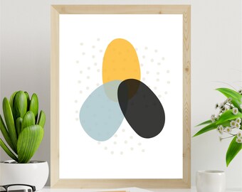 May include: Abstract art print with three overlapping shapes in yellow, blue, and black on a white background with small white dots.