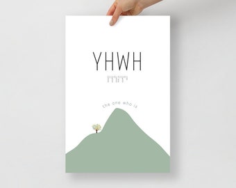 May include: A minimalist print with the word "YHWH" in black text, the Hebrew letters for "YHWH" in gray text, and the phrase "the one who is" in black text. A green hill with a small tree on top is below the text. The print is 12 inches by 18 inches.