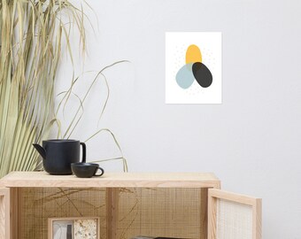 May include: Abstract art print featuring three overlapping shapes in yellow, blue, and black on a white background with a subtle white dot pattern.