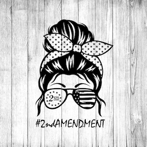 May include: Black and white illustration of a woman with a messy bun, wearing sunglasses with an American flag design and the text "2nd" on one lens. The text "#2ndAMENDMENT" is below the image.