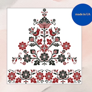 May include: White background with a detailed floral embroidery design in red and black. The design features stylized flowers, leaves, and birds. A blue circle with the text "made in UA" is in the upper right corner.