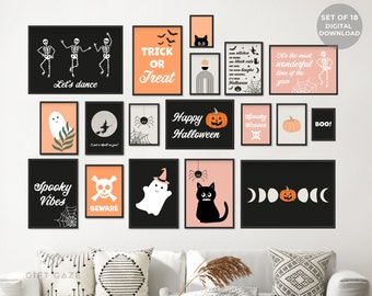 May include: A collection of 18 framed Halloween-themed art prints. The prints feature various spooky illustrations, including skeletons, ghosts, pumpkins, cats, spiders, and phrases like "Trick or Treat" and "Happy Halloween." The color palette includes black, orange, and white.