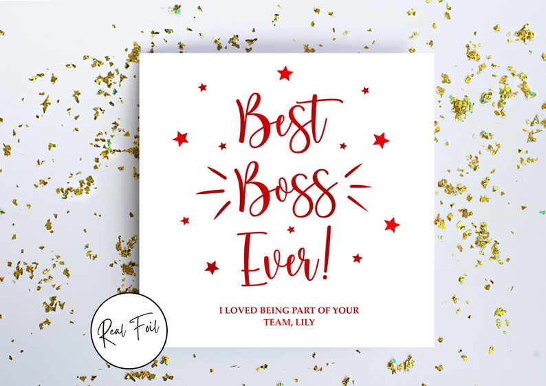 May include: A square white greeting card featuring red text that reads Best Boss Ever! with red stars and decorative lines. Below the main text, it says I LOVED BEING PART OF YOUR TEAM, LILY. A circular badge in the corner reads Real Foil.