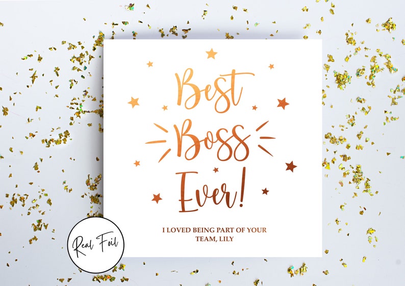 May include: A square white card featuring copper-colored foil text that reads Best Boss Ever! and I LOVED BEING PART OF YOUR TEAM, LILY. The design includes several small copper stars and a circular badge in the corner stating Real Foil.