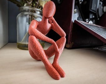 Contemplatieve 3D-geprinte figuur – moderne kunstsculptuur voor huisdecoratie, doordachte pose-ornament