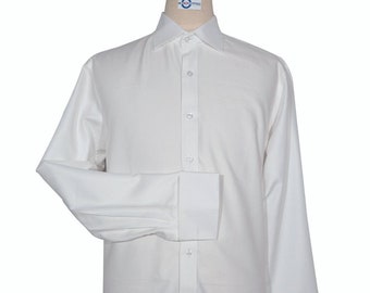 May include: A white long-sleeve dress shirt with a button-down collar and French cuffs.