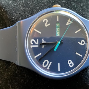 Swatch watch larger face Blue New Gent SUON705 Quartz watch