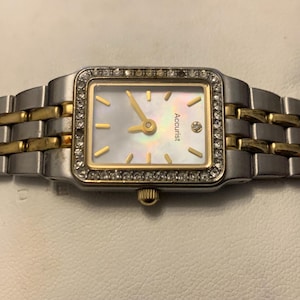 Vintage Accurist Tank style gold and silver  tone Quartz watch with Faux diamonds
