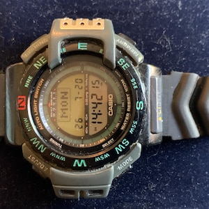 Vintage Casio Pro Trek 1470 PRT40 Triple Sensor Chronograph-klocka från 1990-talet med originalmanual