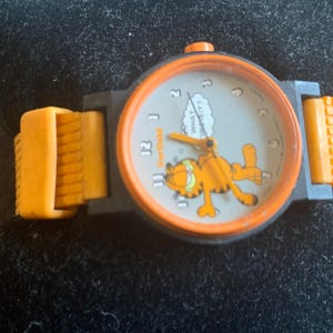 お腹が時計のガーフィールド Garfield ヴィンテージ Garfield wrist watch - Etsy 日本