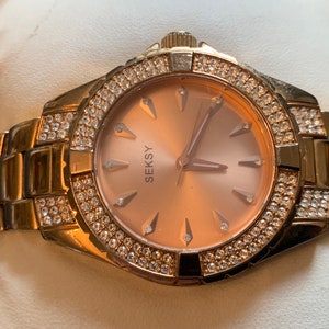 Zegarek damski Sesky by Sekonda N4669 w odcieniu złota z sztucznymi diamentami