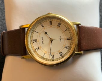 Vintage męski zegarek Pulsar Seiko w odcieniu złota