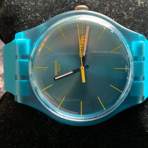 Swatch watch larger face Turquoise SUON700 Quartz watch