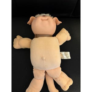 May include: A rustic wooden sign with the text "Welcome to our home" in white lettering. The sign features a distressed finish and a simple, inviting design, perfect for front door decor.