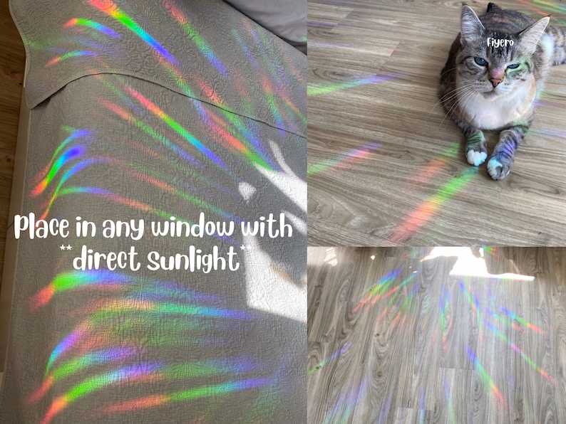 May include: A rainbow prism window cling creates colorful light patterns on a wooden floor and a gray fabric surface. The text "Place in any window with direct sunlight" is visible in the image.