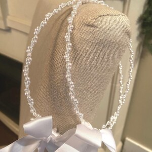 Our Classic Pearl Collection, Wedding Stefana. Surrounded with beautiful white pearl stones and united with a white satin ribbon. Elegance!!