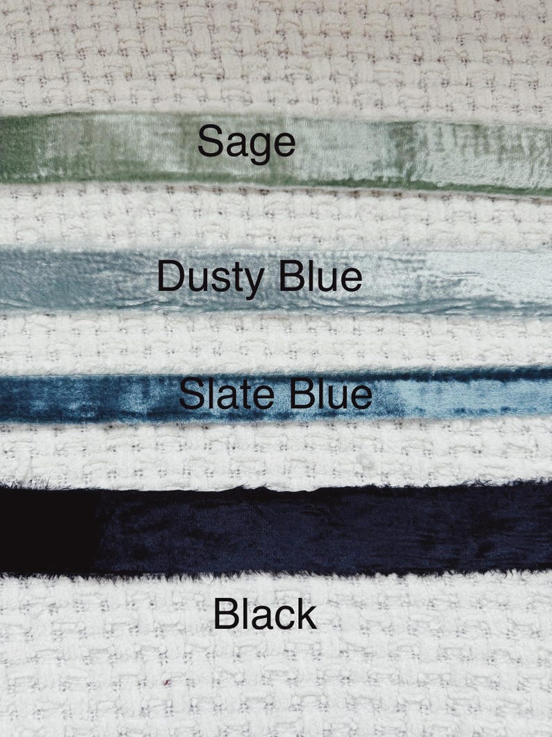 May include: Four velvet ribbon samples in different colors: sage green, dusty blue, slate blue, and black.