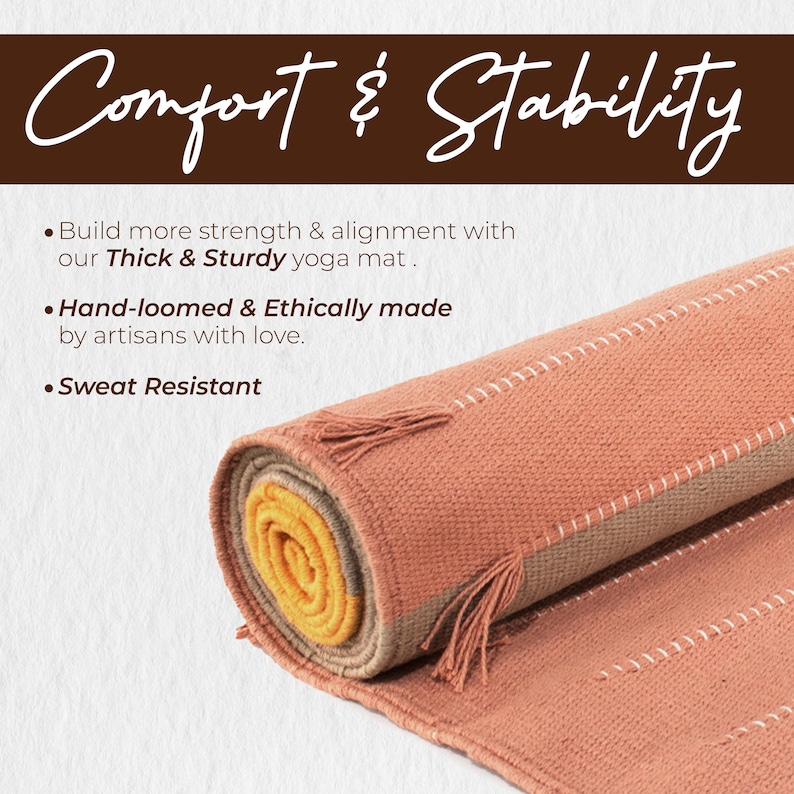 May include: Rolled-up peach-colored yoga mat with a yellow interior. The mat has white stitching and small tassels. Text at the top reads "Comfort & Stability". The description also includes the text "Thick & Sturdy yoga mat", "Hand-loomed & Ethically made", and "Sweat Resistant".
