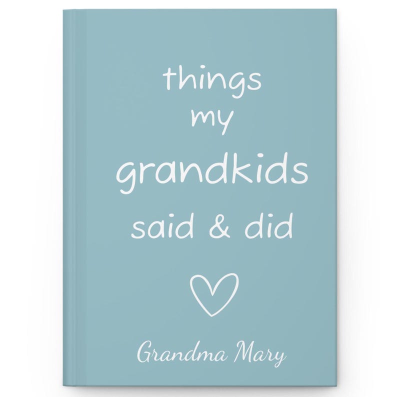 May include: A light blue journal with the text "things my grandkids said & did" in white. A white heart is below the text and the name "Grandma Mary" is at the bottom.
