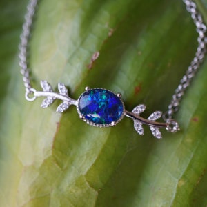Lightning blue sterling silver natural australian opal bracelet, opal bracelet, rainbow opal bracelet, 9x7mm