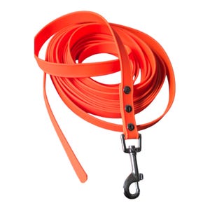 May include: A set of three ceramic mugs with a speckled, matte finish. The mugs are in shades of cream, light gray, and dark gray. Each mug has a simple, minimalist design and a rounded handle. Perfect for coffee or tea.