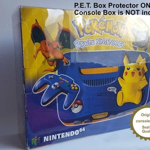 May include: A blue and yellow Nintendo 64 game console box with a Pikachu character on the front. The box is labeled "Pokemon Pikachu Nintendo 64" and "Nintendo 64". The box is in a clear plastic protector. The text "P.E.T. Box Protector ONLY Console Box is NOT included!" is printed on the top of the box.